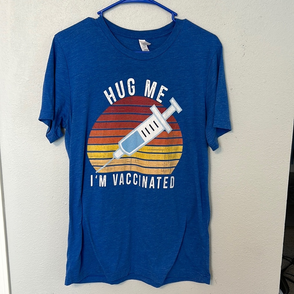 Vaccinated tee shirt. Medium